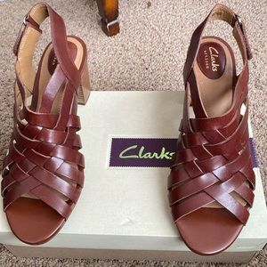 Brown sandals with a heal! Wear with any lenth dress, jeans or pants!